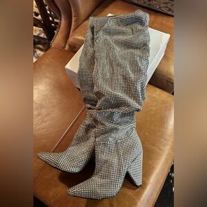 Super edgy silver thigh high women's boots. Size 9.
